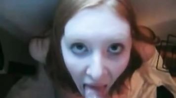 Sweet little redhead sucking cock with facial